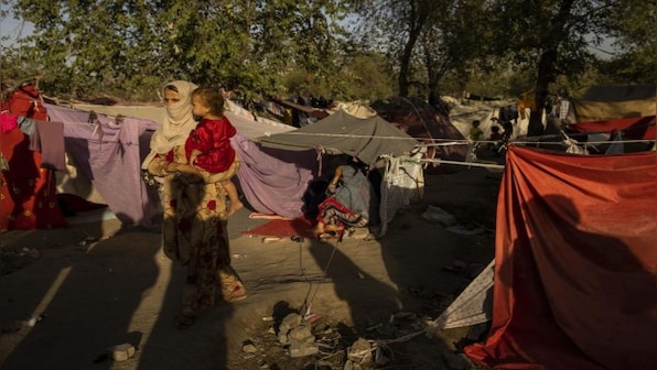 Afghan aid groups struggle to help population at risk with limited resources; foreign funds frozen