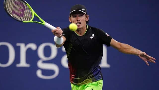 Alex de Minaur, of Australia, returns a shot during the first round of the US Open tennis championships, Tuesday, Aug. 31, 2021, in New York. (AP Photo/Frank Franklin II)