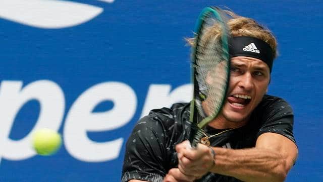 Alexander Zverev, of Germany, returns a shot to Sam Querrey, of the United States, during the first round of the US Open tennis championships, Tuesday, Aug. 31, 2021, in New York. (AP Photo/John Minchillo)