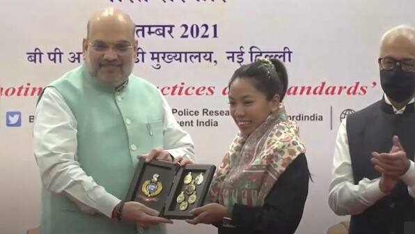 Amit Shah honours Olympic champion Mirabai Chanu