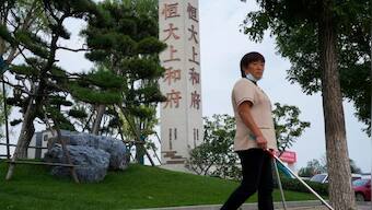 Chinese property developer giant Evergrande stops trading on Hong Kong Stock Exchange