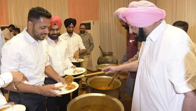 Harmanpreet Singh, member of the Indian men’s hockey team which won a historic bronze medal at Tokyo 2020, is served by Punjab Chief Minister Captain Amarinder Singh.