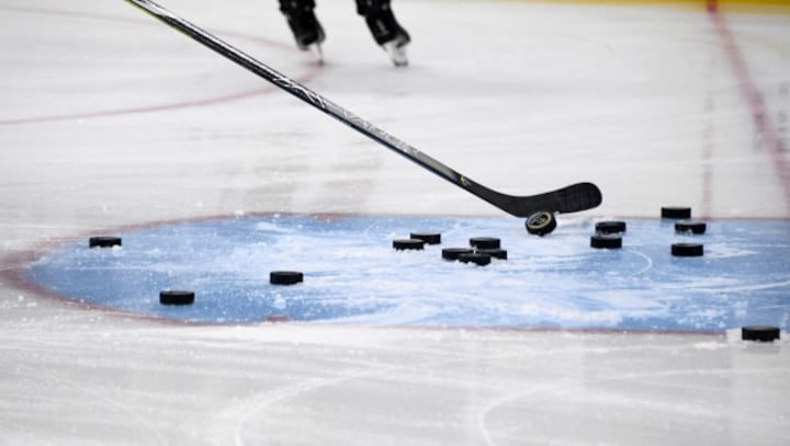 Top Belarus ice hockey official steps down after controversy over threatening players for political views
