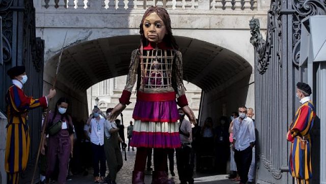 Meet 'Little Amal', 11-feet tall puppet, spreading awareness of Syrian refugees across Europe Meet 'Little Amal', 11-feet tall puppet, spreading awareness of Syrian refugees across Europe