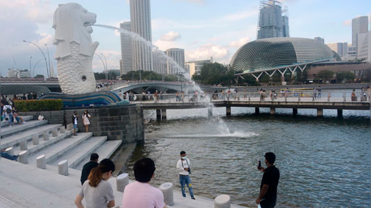 Living with COVID-19: Singapore's strategy raises hope and and concern among citizens as cases skyrocket