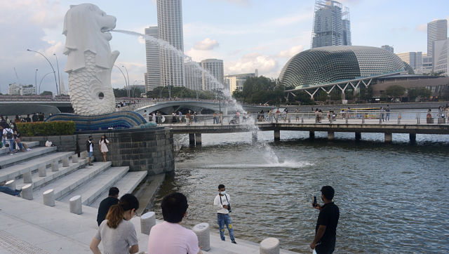 Living with COVID-19: Singapore's strategy raises hope and and concern among citizens as cases skyrocket Living with COVID-19: Singapore's strategy raises hope and and concern among citizens as cases skyrocket