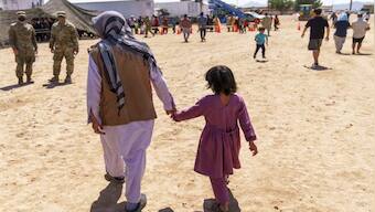 US gives first public look inside the base where Afghans who fled Taliban are being housed