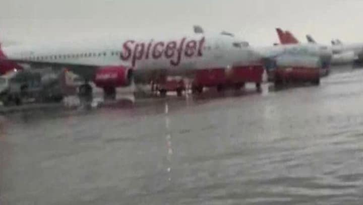 Delhi's record rainfall leaves roads waterlogged, airport flooded; IMD issues orange alert