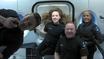 SpaceX capsule with its first all-civilian orbital crew splashes down in Atlantic