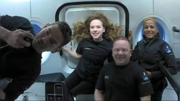 SpaceX capsule with its first all-civilian orbital crew splashes down in Atlantic
