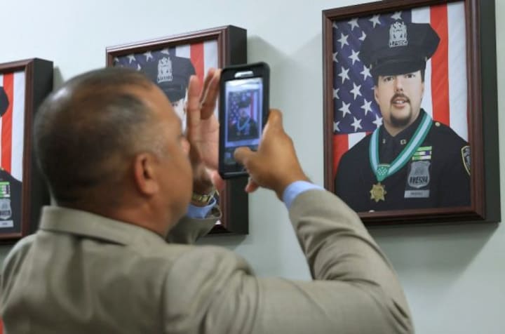 NYC Police unveils 'Wall of Heroes' memorial honouring cops who laid their lives down on 9/11