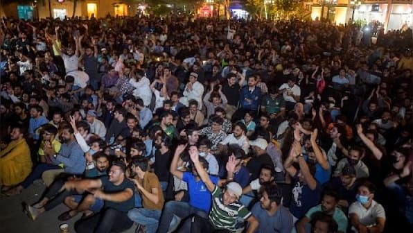 Guns and songs as Pakistan hails 'myth-busting' stars after T20 World Cup win over India