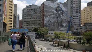 Art for a cause: Brazilian artist paints mural from ashes collected from Amazon fires