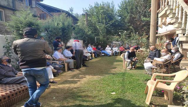  Mourners visiting the home of ML Bindroo, who was shot dead by militants. Quratulain Rehbar