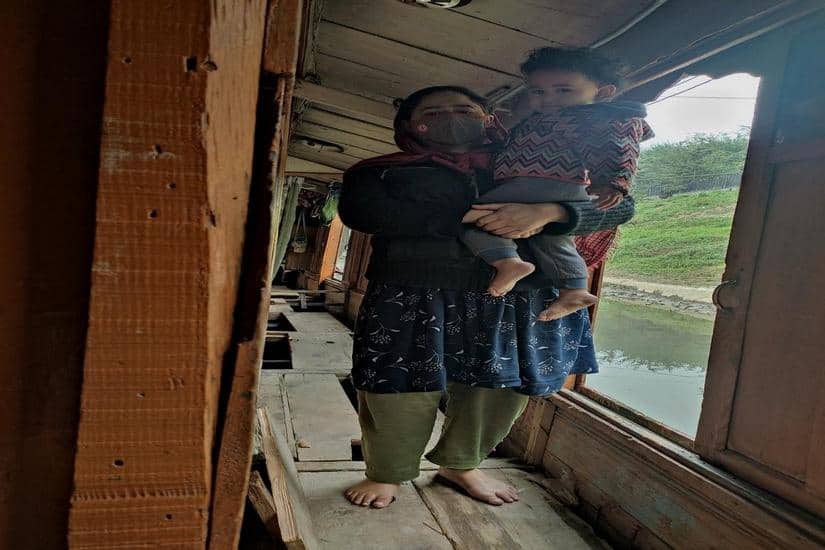 Realising her houseboat was sinking, Bano rushed to save her children. Quratulain Rehbar 