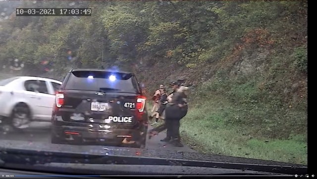 US officer's quick response saves colleague's life from careening car; watch viral video here US officer's quick response saves colleague's life from careening car; watch viral video here