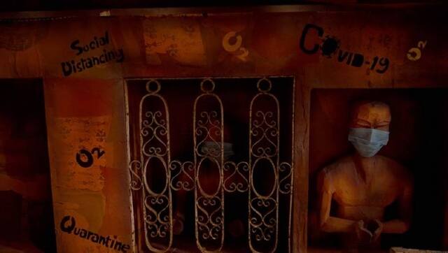 A theme illustrating the post-pandemic future at the Shiv Mandir Puja pandal in South Kolkata. PTI 