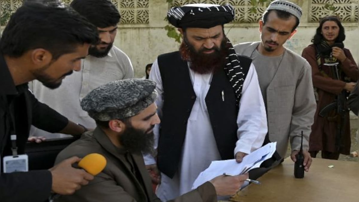 Threatened Afghans hopeful of fleeing after Taliban resumes passport services