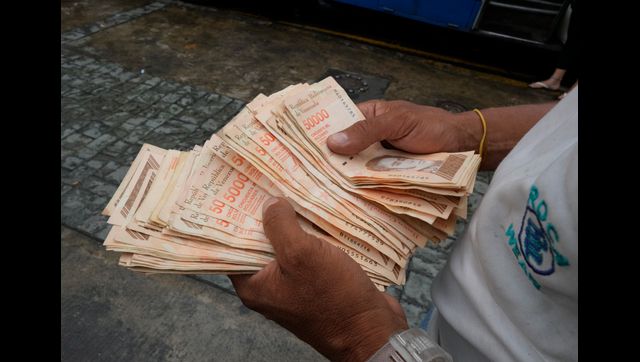 Fighting hyperinflation woes, Venezuela introduces new currency with six fewer zeros Fighting hyperinflation woes, Venezuela introduces new currency with six fewer zeros