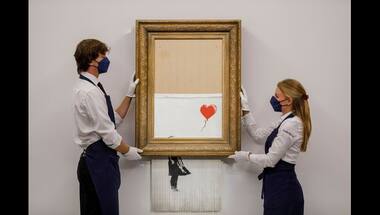 Shredded Banksy artwork sells for $25.4 million at auction