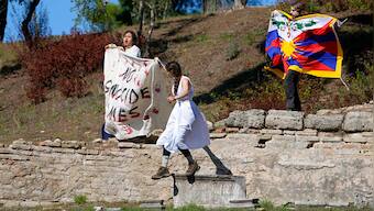 Beijing Winter Olympics: Activists unfurl Tibet flag, 'no genocide games' banner at flame ceremony