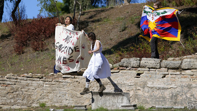 Beijing Winter Olympics: Activists unfurl Tibet flag, 'no genocide games' banner at flame ceremony Beijing Winter Olympics: Activists unfurl Tibet flag, 'no genocide games' banner at flame ceremony