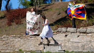 Beijing Winter Olympics: Activists unfurl Tibet flag, 'no genocide games' banner at flame ceremony