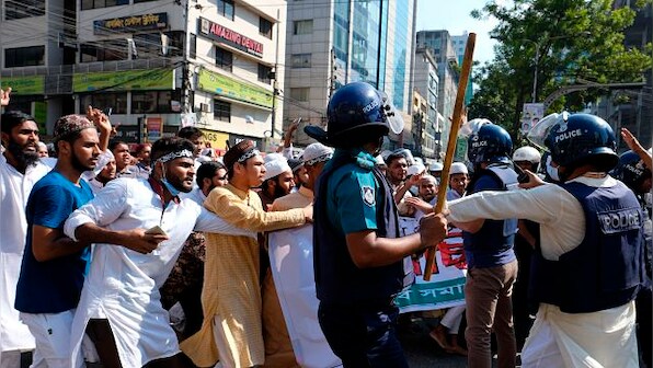 Bangladesh: Protests erupt in Dhaka amid Muslim-Hindu tensions; security forces use tear gas and batons
