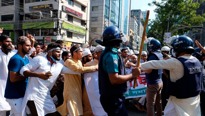 Bangladesh: Protests erupt in Dhaka amid Muslim-Hindu tensions; security forces use tear gas and batons