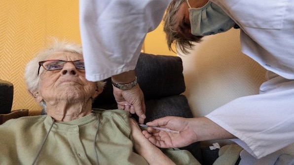 A jab in each arm: France kicks off vaccination programme against flu and COVID-19