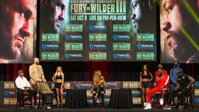 Tyson Fury, Deontay Wilder kept apart after sparks fly at press conference Tyson Fury, Deontay Wilder kept apart after sparks fly at press conference