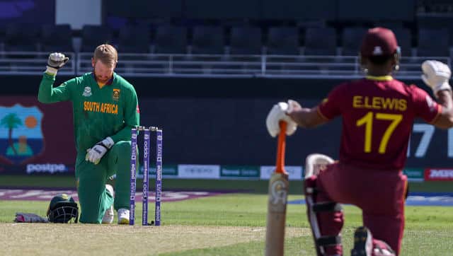 South Africa’s Heinrich Klaasen, left, and West Indies’ Evin Lewis take the knee ahead of the match. A Cricket South Africa (CSA) directive had ordered their players to take a knee (as a gesture of battle against racism). However, in controversial circumstances, Quinton de Kock opted out of the match, refusing to take the knee. Reeza Hendricks replaced him instead. AP 