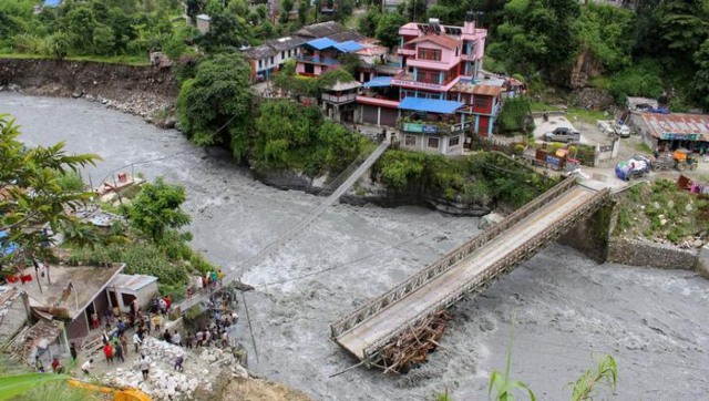 Toll climbs to 104 as rains lash Nepal, trigger floods and landslides Toll climbs to 104 as rains lash Nepal, trigger floods and landslides