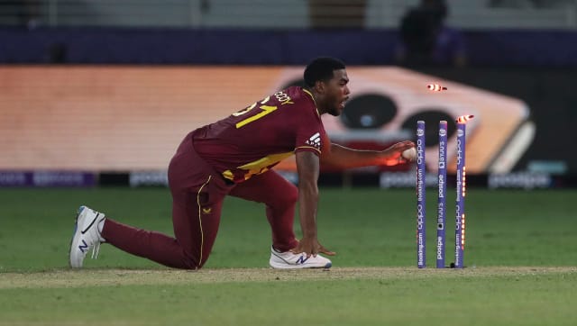 Obed McCoy runs Moeen Ali out for 3. AP