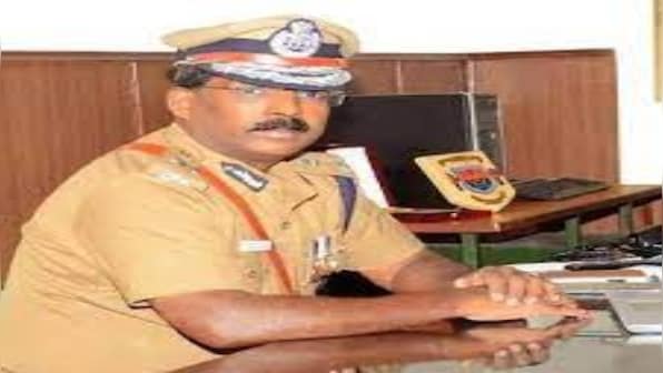 Officer wears bloodstained cap and badge on retirement day; they were evidence in Rajiv Gandhi's assassination case