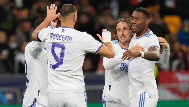 Left to right: Real Madrid's Lucas Vazquez, Karim Benzema, Luka Modric and David Alaba celebrate after scoring their side's second goal during the Champions League group D soccer match between Shakhtar Donetsk and Real Madrid at the Olympiyskiy stadium in Kyiv, Ukraine, Tuesday, Oct. 19, 2021. (AP Photo/Efrem Lukatsky)