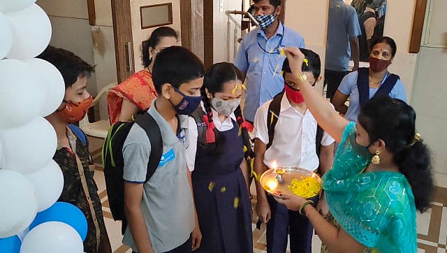 More students being greeted by teachers in the school at Dadar. Image credit: Sachin Gokhale 