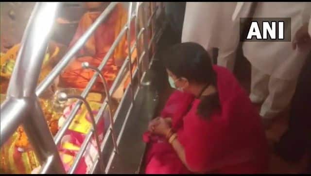 Union Minister Smriti Irani is seen offering prayers at Durga Temple in Uttar Pradesh. ANI 