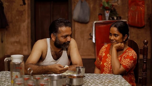 Ajisha Prabhakaran and Manoj K.U. in a still from Thinkalazhcha Nishchayam