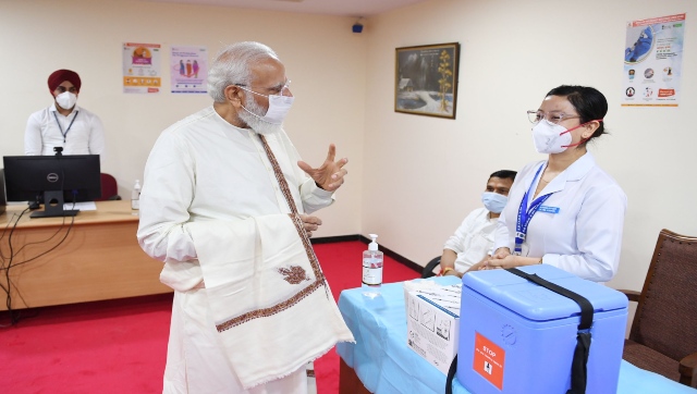 PM Modi interacts with beneficiaries, healthcare workers as India hits 100 crore vaccine milestone PM Modi interacts with beneficiaries, healthcare workers as India hits 100 crore vaccine milestone