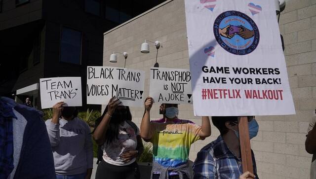 People protest outside the Netflix building in the Hollywood section of Los Angeles, Wednesday, 20 October, 2021. Critics and supporters of Dave Chappelle’s Netflix special and its anti-transgender comments gathered outside the company’s offices Wednesday (AP Photo/Damian Dovarganes)