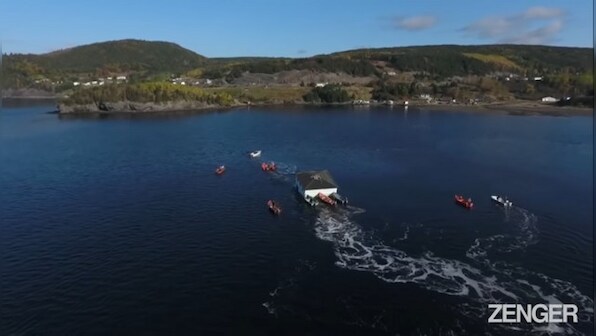 Canadian couple uses boats to shift their home to new spot; check out viral video here