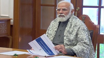 Narendra Modi asks officials to review easing of international travel curbs over new COVID-19 variant Omicron