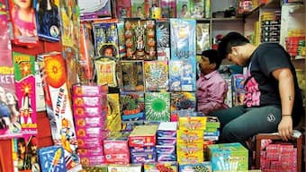 What are green crackers and what makes them eco-friendly and less polluting