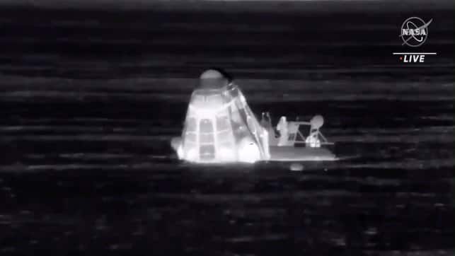The capsule is recovered after splashing down into the Gulf of Mexico. AP 