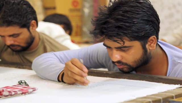 Artisans work on ‘The Tree Light’, which evokes the elements of a Kadamb tree. Photo Courtesy: Kaaru