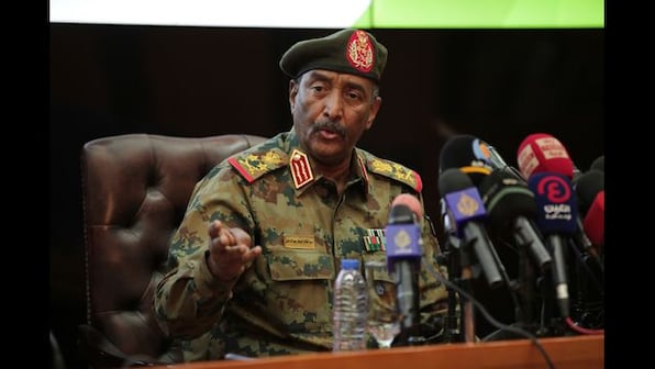 Two weeks after military coup, Sudanese general tightens grip on power