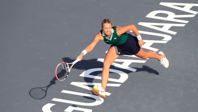 Anett Kontaveit of Estonia returns a shot to Czech Republic's Barbora Krejcikova during a match of the Mexican Tennis WTA Finals in Guadalajara, Mexico, Wednesday, Nov. 10, 2021. (AP Photo/Refugio Ruiz)