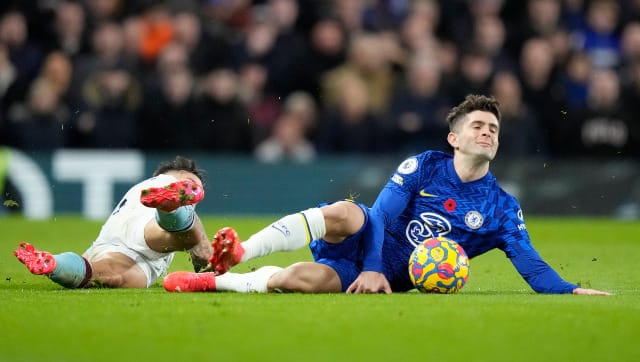 Chelsea's Christian Pulisic fights for the ball with Burnley's Josh Brownhill during the Premier League meeting at Stamford Bridge. AP