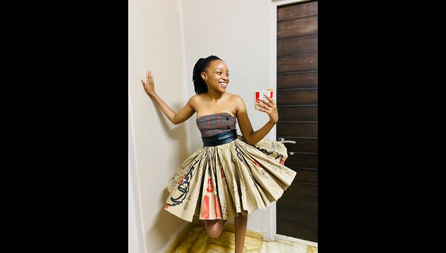 South African woman makes dress from recycled KFC packaging, social media users hail creativity South African woman makes dress from recycled KFC packaging, social media users hail creativity